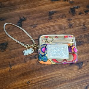 Coach wristlet mini wallet in jewel tone signature Poppy